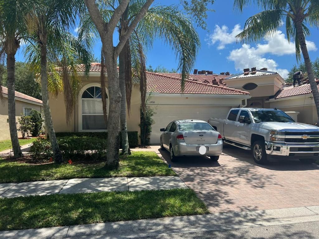 Photo of 2460 Sandy Cay, West Palm Beach, FL 33411 (MLS # R10984372)