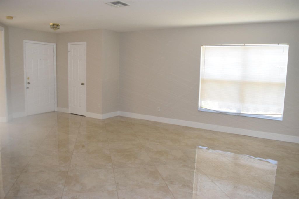 Photo of 2806 SW Seaside Road, Port Saint Lucie, FL 34953 (MLS # R11015923)