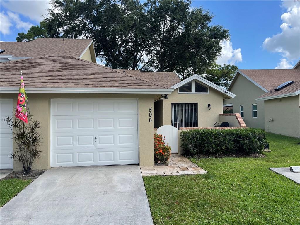 Photo of 506 Maplewood Dr Dr, Green Acres, FL 33415 (MLS # F10335695)