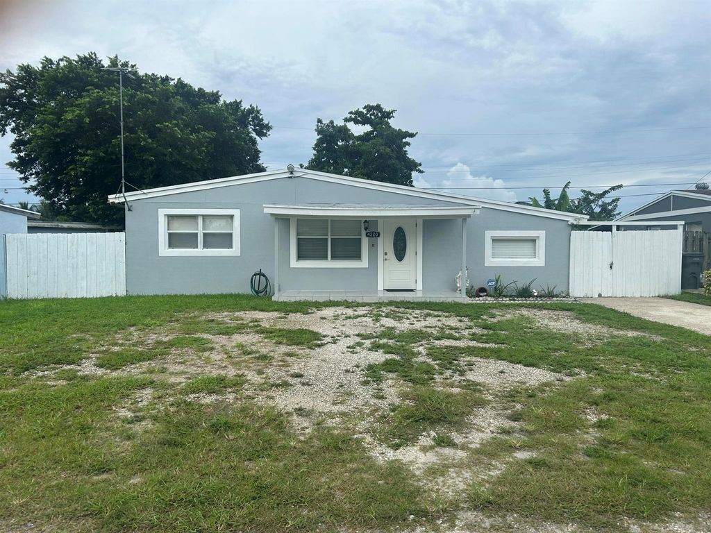 Photo of 4220 NE Garand Lane NE, West Palm Beach, FL 33406 (MLS # R11124507)