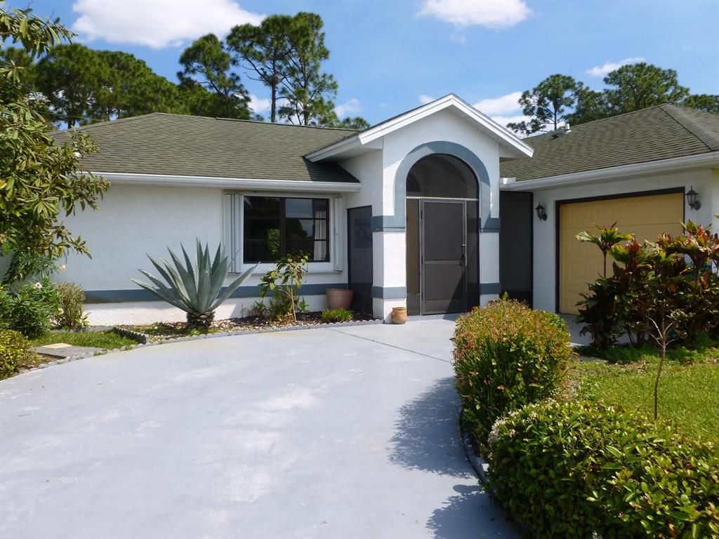 Photo of 1733 SW Ardmore Street, Port Saint Lucie, FL 34953 (MLS # R10700362)