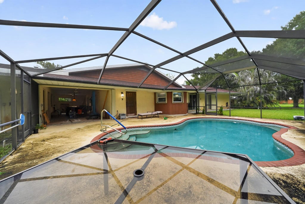 Photo of 7105 SANTA ROSA Parkway, Fort Pierce, FL 34951 (MLS # B26066387)