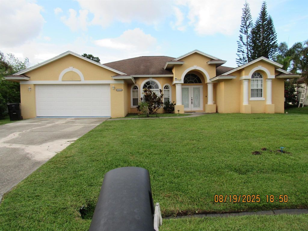 Photo of 1583 SW Silver Lane, Port Saint Lucie, FL 34953 (MLS # R11116766)