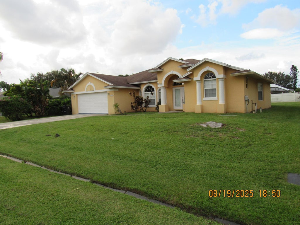 Photo of 1583 SW Silver Lane, Port Saint Lucie, FL 34953 (MLS # R11116766)