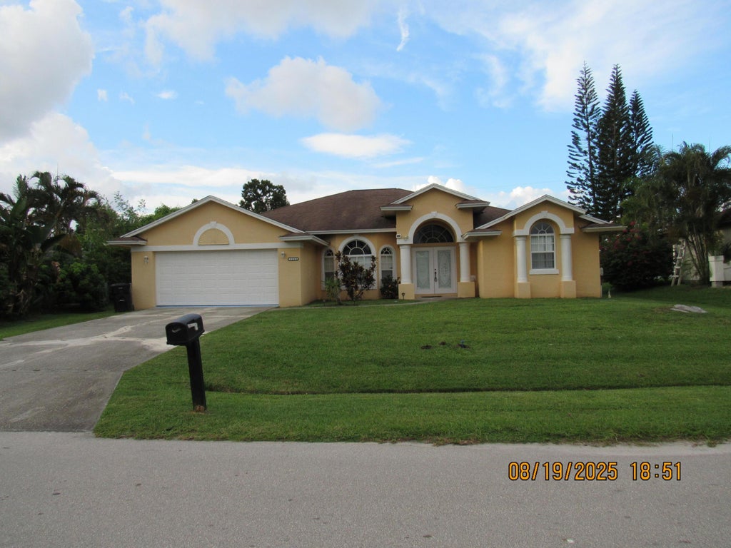 Photo of 1583 SW Silver Lane, Port Saint Lucie, FL 34953 (MLS # R11116766)