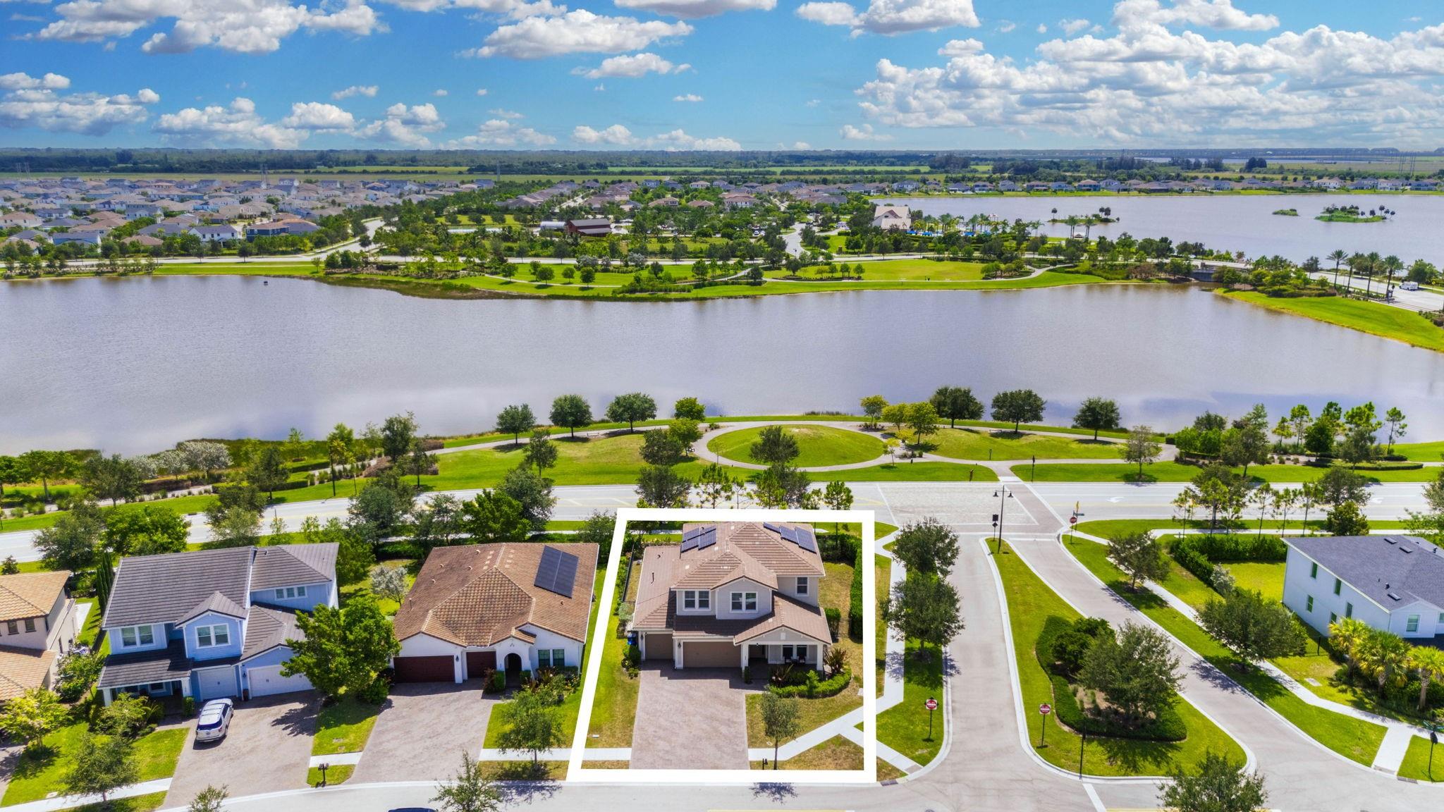 Resort-style living awaits in the gated, master-planned Arden community! This 4-bed, 4-bath home with 3-car garage was completely remodeled in 2025 with over $250K in high-end upgrades. Built in 2019 on a corner lot with water views, it offers 10’ ceilings, crown moulding, premium porcelain tile, a private office, loft, and ensuite guest room. The chef’s kitchen shines with quartz countertops, double ovens, walk-in pantry, and a sunny breakfast nook. Enjoy a fenced yard, screened porch, solar panels, and whole-home water filtration. Arden features a rooftop pool, clubhouse, fitness center, trails, kayak launch, fishing dock, tennis, playgrounds, and a charming community barn with organic produce.
