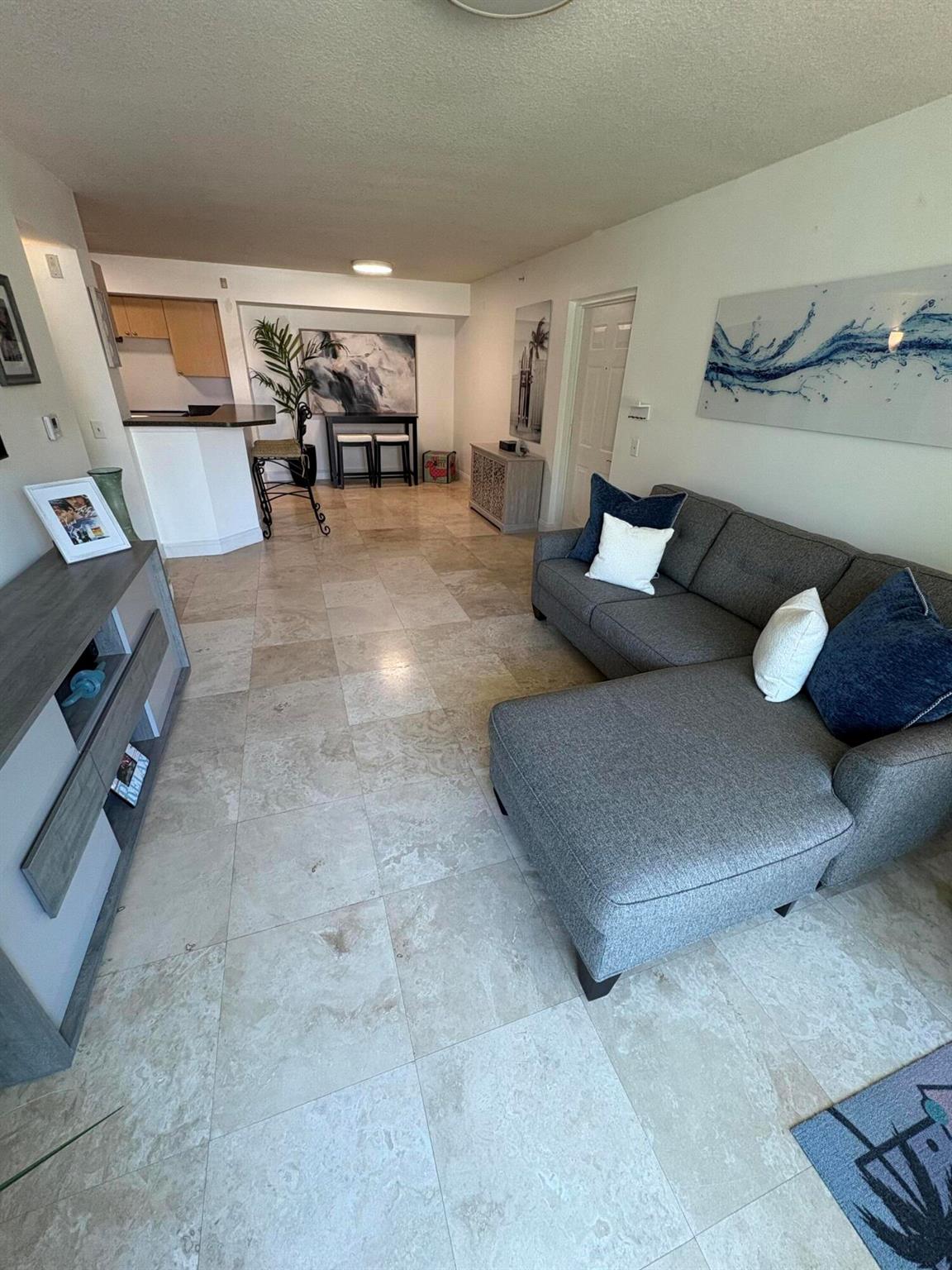 This fully furnished one-bedroom condo is designed to evoke a beach-inspired atmosphere, featuring decor and colors that reflect a relaxing coastal vibe. Residents will appreciate the convenience of a new washer/dryer combo, which efficiently handles both washing and drying your laundry in one unit. In addition, a new microwave is being installed to further enhance your kitchen experience. For added convenience, the seasonal lease includes a biweekly house cleaning service, ensuring your living space remains fresh and welcoming.The community offers a wide range of resort-style amenities to enrich your lifestyle. Enjoy the outdoor pool, perfect for relaxing or socializing with neighbors. Stay active with access to indoor racquetball and basketball courts.