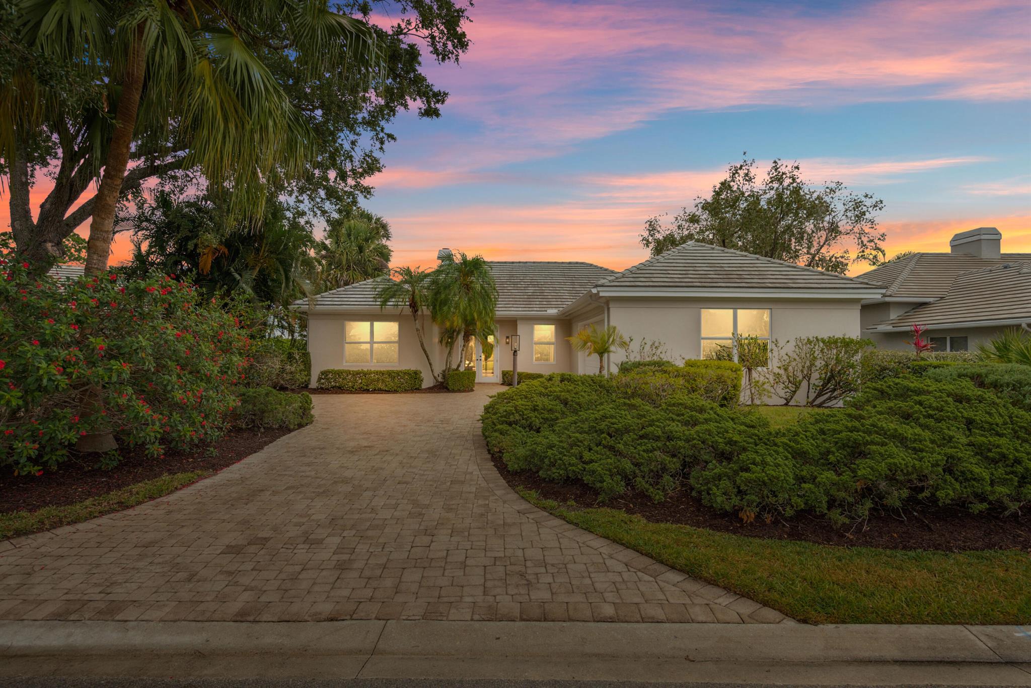 Waterfront and Golf Views, this is the perfect home to fit all your needs! Enjoy this BRAND NEW, waterfront, and move in ready 3BR/2.5BA home in the prestigious PGA Village. Every detail has been thoughtfully updated--BRAND NEW ROOF, BRAND NEW IMPACT windows and sliding doors, designer kitchen, custom bathrooms, new flooring, lighting, and premium Samsung appliances! No expense spared and not a single detail overlooked; this home is truly turnkey. Enjoy stunning golf course and lake views from your expansive master suite, as well as a private backyard spa, and an oversized two-car garage with additional parking. This is a rare opportunity in South Florida for luxury living in Port Saint Lucie's most desirable neighborhood.