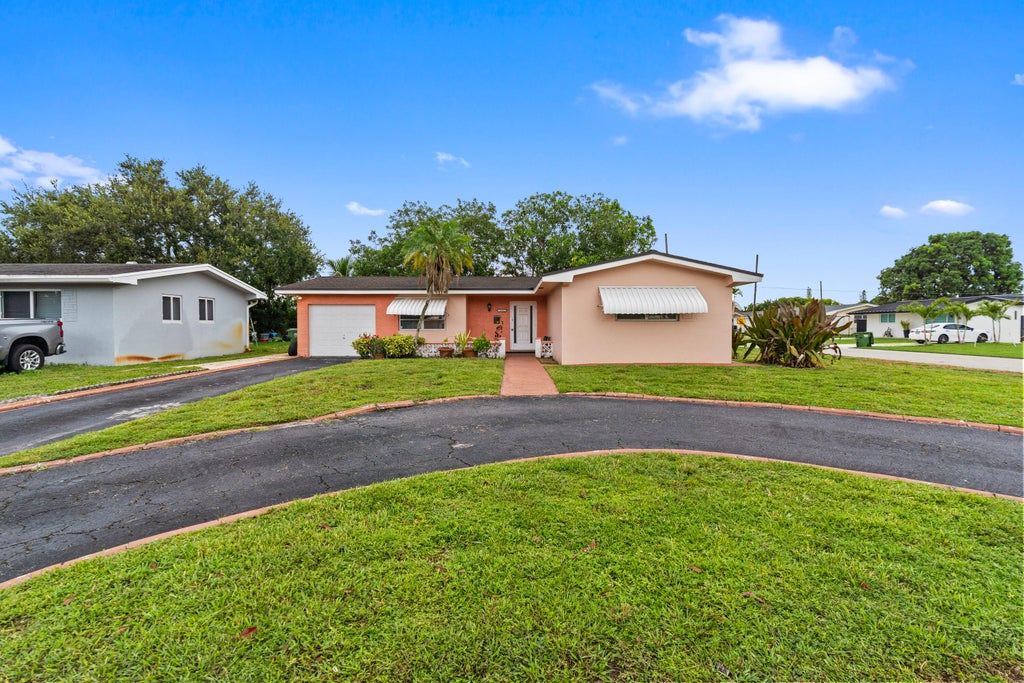 Photo of 1111 NW 85TH Way, Pembroke Pines, FL 33024 (MLS # B26061703)