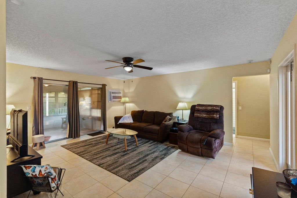 Photo of 1111 NW 85TH Way, Pembroke Pines, FL 33024 (MLS # B26061703)