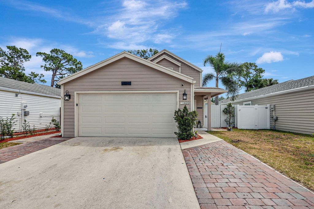 Photo of 1420 Corn Flower Lane, West Palm Beach, FL 33415 (MLS # R10983825)