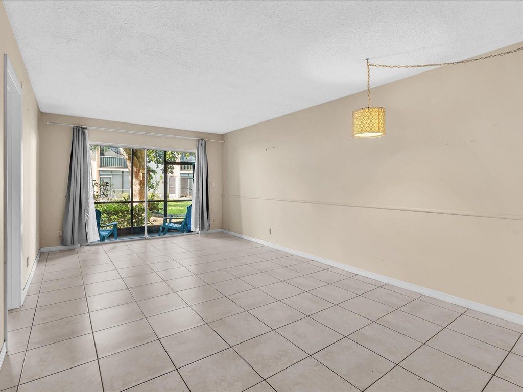 Photo of 4165 NW 90th Avenue #103, Coral Springs, FL 33065 (MLS # F10515929)