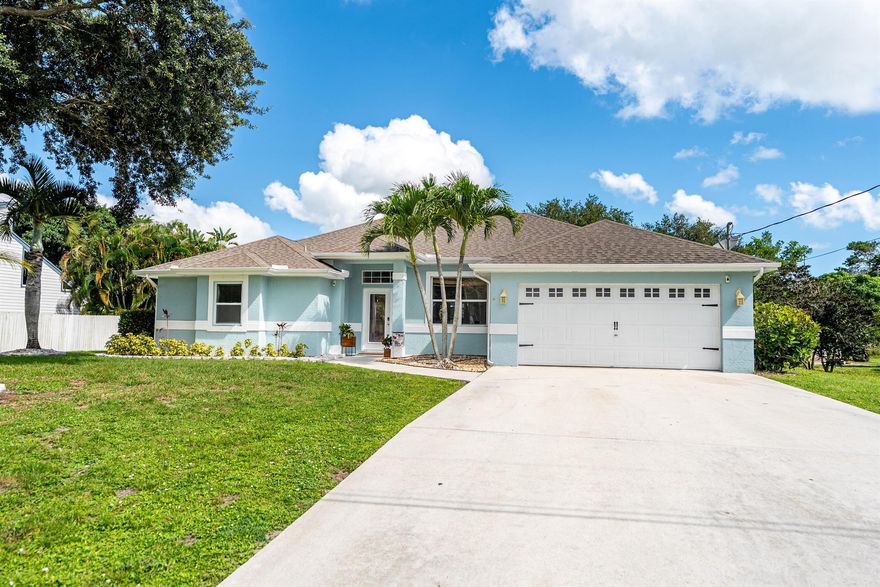 Discover your dream home in the heart of Hobe Sound! This beautiful 3 bed, 2 bath pool home sits on almost half an acre with NO HOA-bring your boats, RV's, and toys with ease. Open floor plan with split bedrooms, spacious master suite & bathroom, volume ceilings, his & hers walk in closets . New smart fridge and washer/dryer. Freshly painted ceilings with new baseboards and door trim. Fully screened pool with LED color changing lights, new pump and filter. Large backyard with room to expand. Quiet, family-friendly neighborhood minutes from Jupiter Island beaches, Jonathan Dickinson State park, Jimmy Graham boat ramp, and great schools. A slice of paradise near the coast!