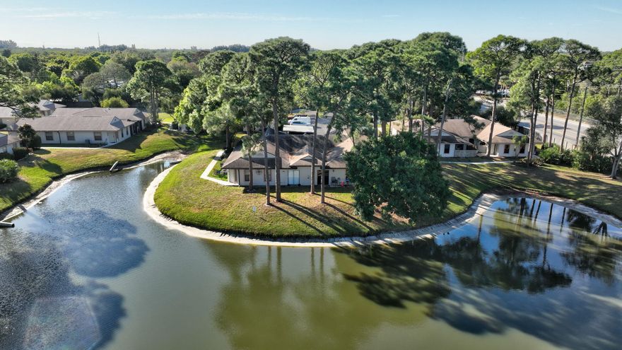 Beautiful corner-unit villa ideally located in the heart of the city. Just minutes from major attractions and only 10 minutes to the stunning Atlantic Ocean. Situated in a quiet, family-friendly community overlooking a serene pond. This home features a desirable split floor plan, a spacious kitchen, and is one of the few units in the community that includes a private carport. A rare opportunity to enjoy comfort, convenience, and location all in one.