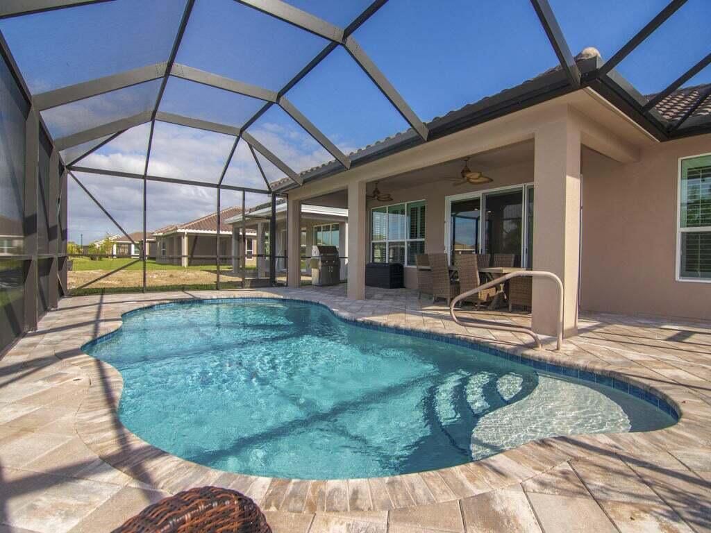 Photo of 10366 SW Ligustrum Drive, Port Saint Lucie, FL 34987 (MLS # R10974864)