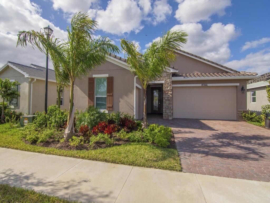 Photo of 10366 SW Ligustrum Drive, Port Saint Lucie, FL 34987 (MLS # R10974864)