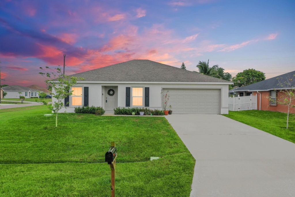 Photo of 591 SW Halifax Avenue, Port Saint Lucie, FL 34953 (MLS # R11090099)