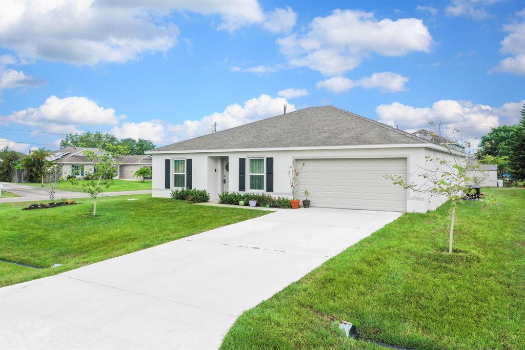 Photo of 591 SW Halifax Avenue, Port Saint Lucie, FL 34953 (MLS # R11090099)