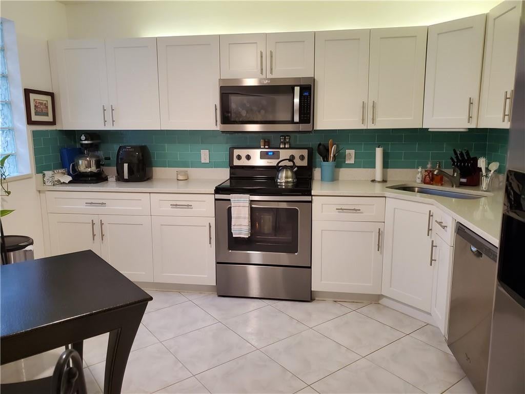 Photo of 5147 Europa Drive #I, Boynton Beach, FL 33437 (MLS # B26029271)