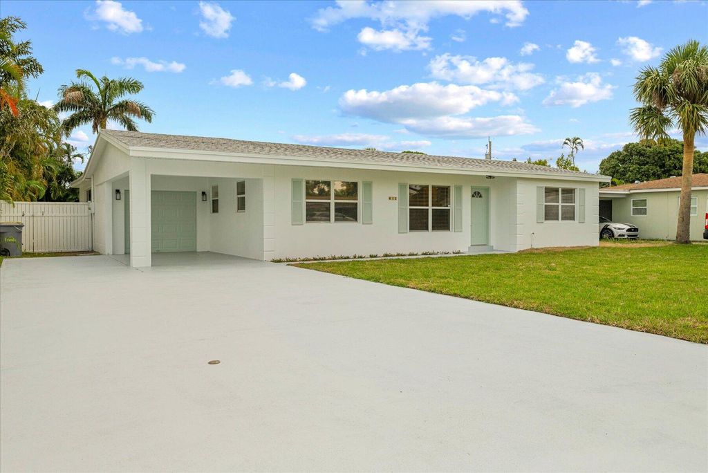 Photo of 643 Australian Circle, Lake Park, FL 33403 (MLS # R10991782)