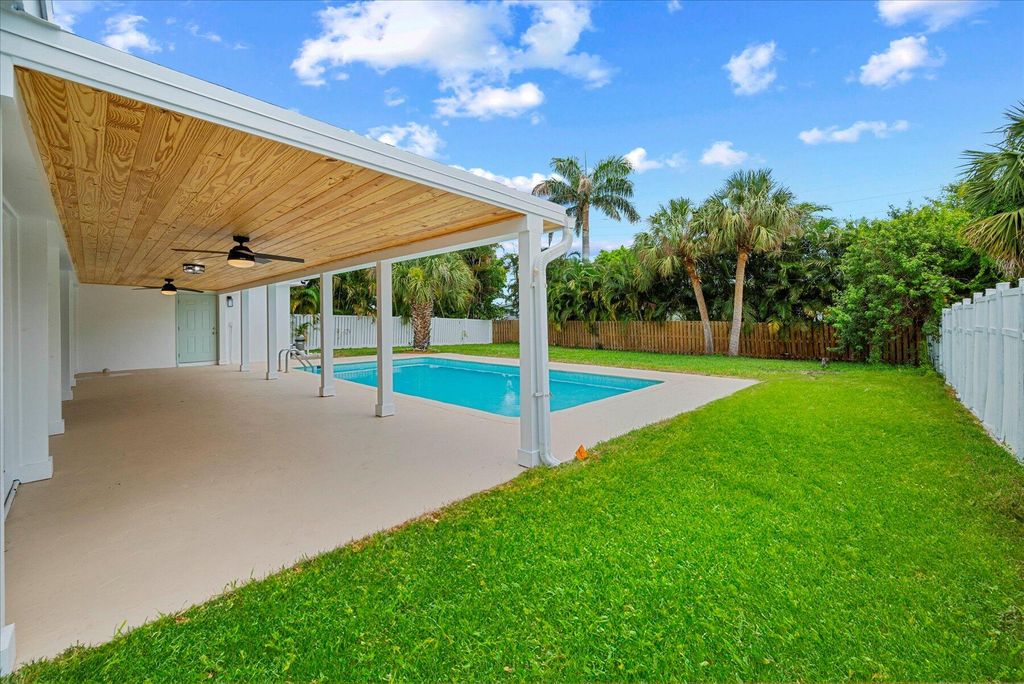 Photo of 643 Australian Circle, Lake Park, FL 33403 (MLS # R10991782)