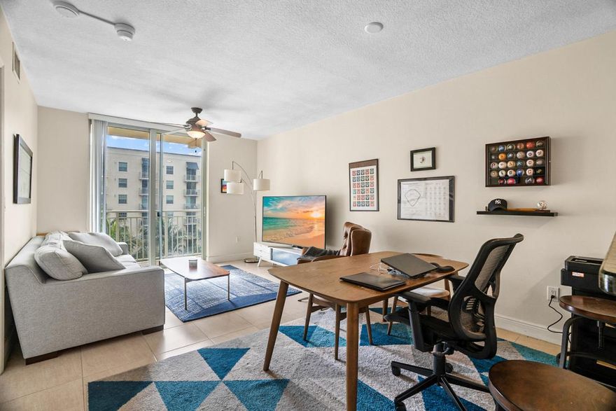 Enjoy downtown West Palm Beach living at sought-after 610 Clematis. This 6th-floor 1-bedroom, 1.5-bath residence overlooks the resort-style pool and courtyard with a desirable south exposure. The open kitchen flows 
into the living and dining areas, creating an ideal space for everyday living and entertaining. Features include impact windows, in-unit washer and dryer, walk-in closet, and a private balcony with pool & courtyard views. Building amenities include a 24-hour doorman, garage parking, fitness center, sauna, steam room, business center, jacuzzi, and a beautifully landscaped courtyard with grilling and outdoor seating areas. Located in the heart of West Palm Beach , just steps from dining, shopping, nightlife, the waterfront, high speed Bright Line & TriRail train services.