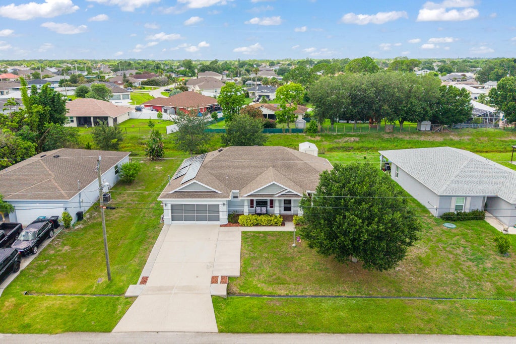 Photo of 4562 SW Bradbury Street, Port Saint Lucie, FL 34953 (MLS # B26045624)