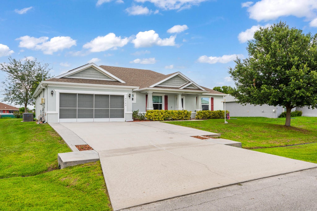Photo of 4562 SW Bradbury Street, Port Saint Lucie, FL 34953 (MLS # B26045624)