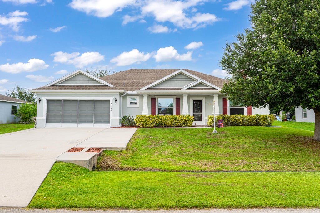 Photo of 4562 SW Bradbury Street, Port Saint Lucie, FL 34953 (MLS # B26045624)