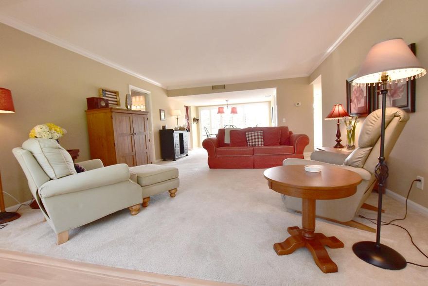 Ideal comfort & value! Delightful 2BR 2BA second floor residence located in the lovely Sandpiper section of Quail Ridge. Great golf views South Course. Enter thru the lovely beveled glass front door to this light and bright home. Crown molding thru out living area, the terrace has been opened & leveled and has a full wall of plantation shutters offer perfect daylight management & provide privacy at night. Pergo flooring in terrace area, foyer, master bath & kitchen. The kitchen has extra white gloss cabinetry topped with black granite counters, the refrigerator & range has been moved creating a more open feeling in the bright and cheery kitchen. Hi-hats, glass inset door and a large window add all the lighting you need. Dining area with wet bar easy entertaining. Mandatory membership.   Quail Ridge is a private, member-owned community and club. All residents are members of The Club at Quail Ridge and have a choice of Full, Intermediate or Primary Membership.