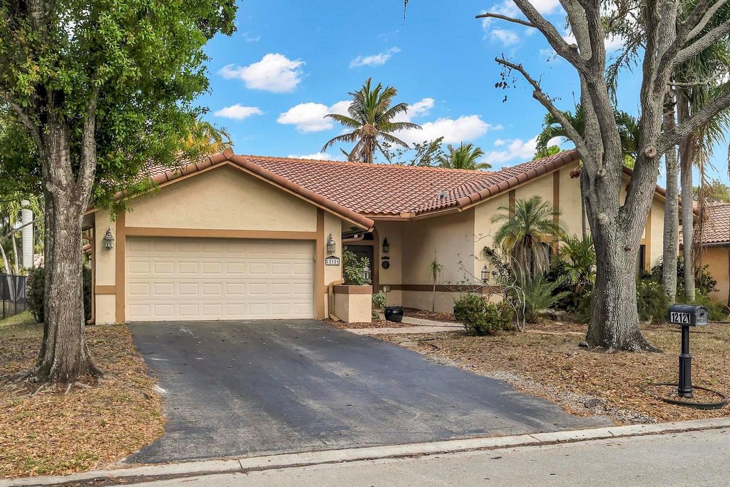 Photo of 12121 NW 2nd Drive, Coral Springs, FL 33071 (MLS # F10555862)