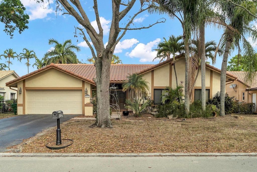 Photo of 12121 NW 2nd Drive, Coral Springs, FL 33071 (MLS # F10555862)