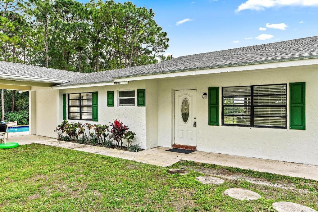 Photo of 6474 143rd Street N, Palm Beach Gardens, FL 33418 (MLS # R10950805)
