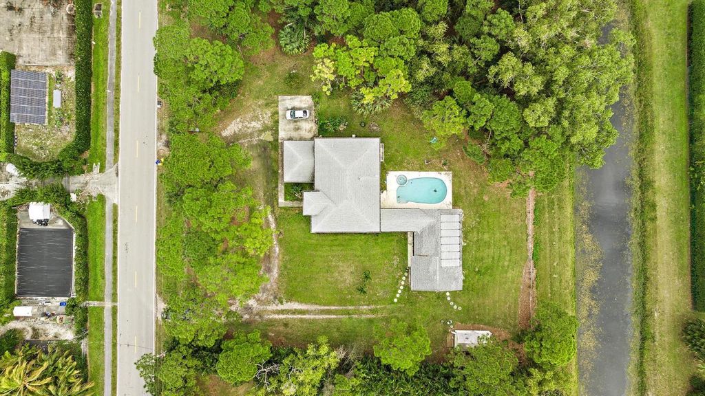Photo of 6474 143rd Street N, Palm Beach Gardens, FL 33418 (MLS # R10950805)
