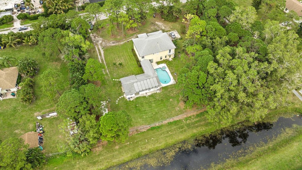 Photo of 6474 143rd Street N, Palm Beach Gardens, FL 33418 (MLS # R10950805)