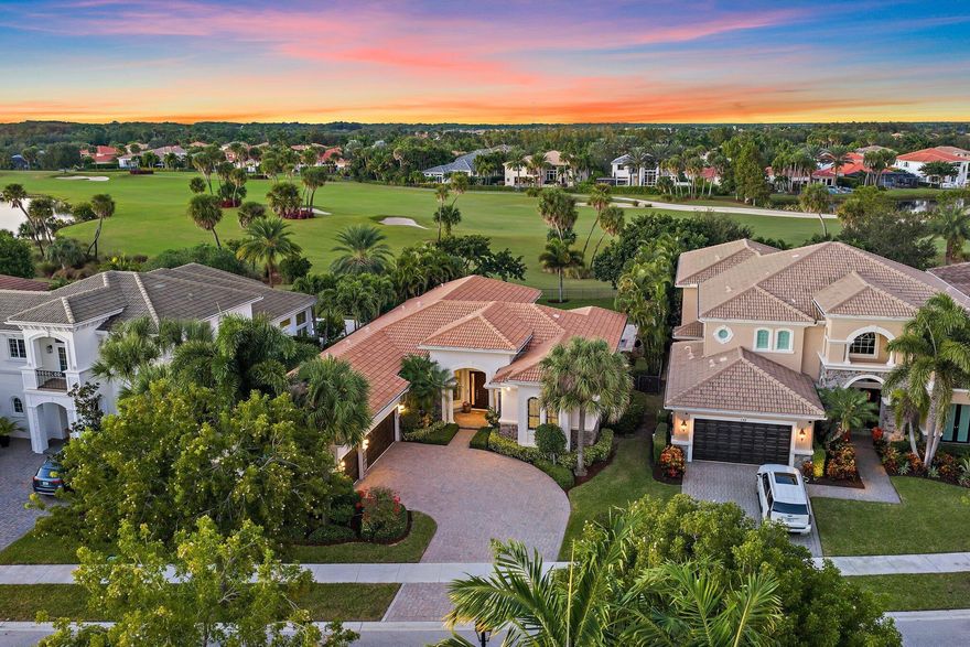 Jupiter Country Club living at its finest! This Castania model is set on an oversized lot and was customized for larger guest bedrooms, along with many other upgrades. This 4 bed 4 bath plus office, triple split floor plan has polished marble floors, solid core doors, upgraded kitchen, custom pool with hot tub and sun shelf, built in summer kitchen, enormous patio, and a backyard located on the 16th hole. Enjoy expansive golf views from almost anywhere in the house.
