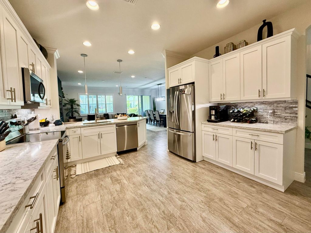 Photo of 168 Crape Myrtle Lane, Wellington, FL 33414 (MLS # B26016574)