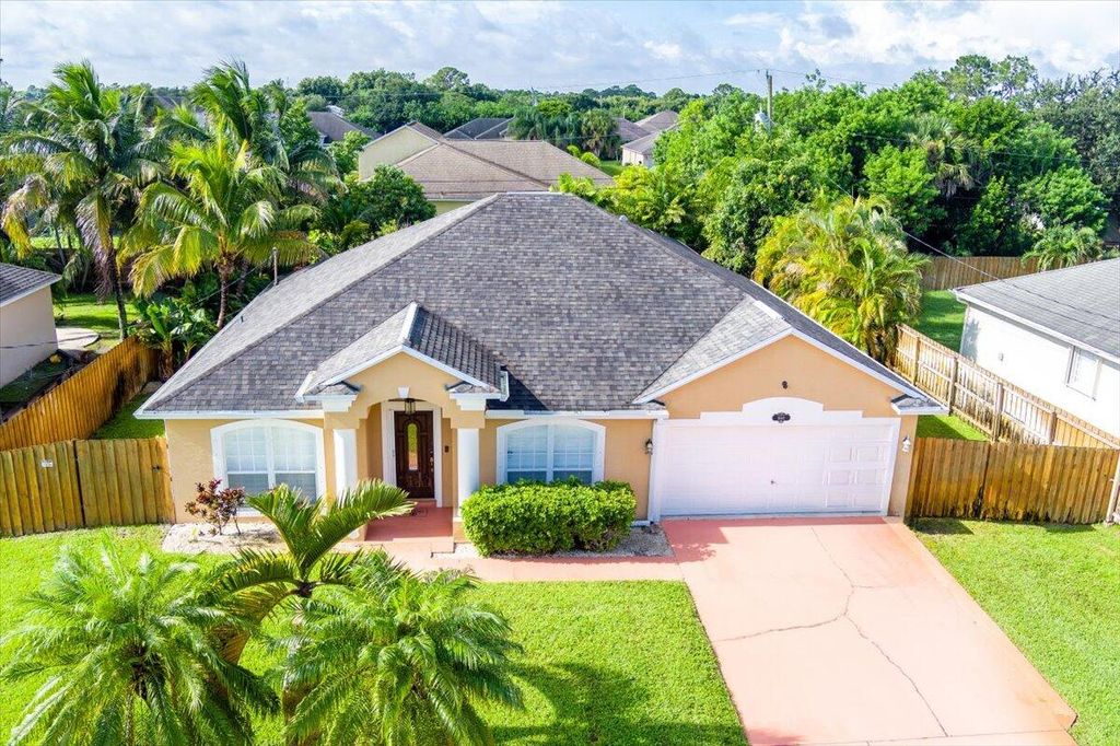 Photo of 1060 SW Idol Avenue, Port Saint Lucie, FL 34953 (MLS # R11011162)
