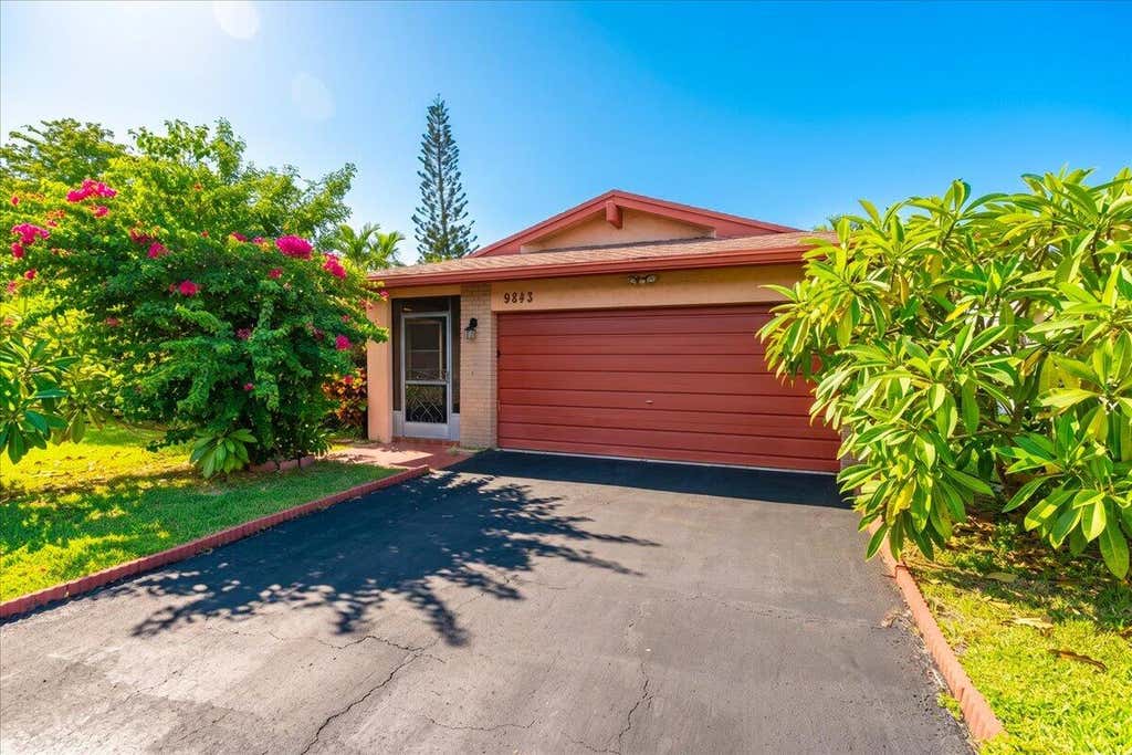 Photo of 9843 NW 75TH Court NW, Tamarac, FL 33321 (MLS # B26069137)