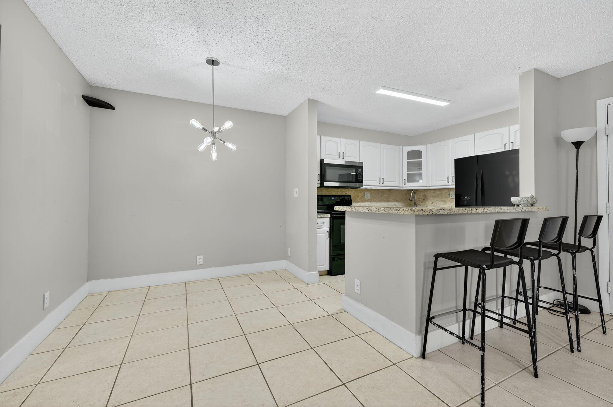 TAMARAC GARDENS CONDOMINI - Residential