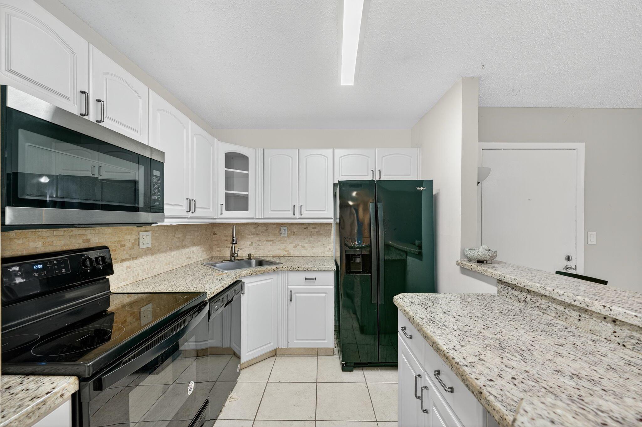 TAMARAC GARDENS CONDOMINI - Residential