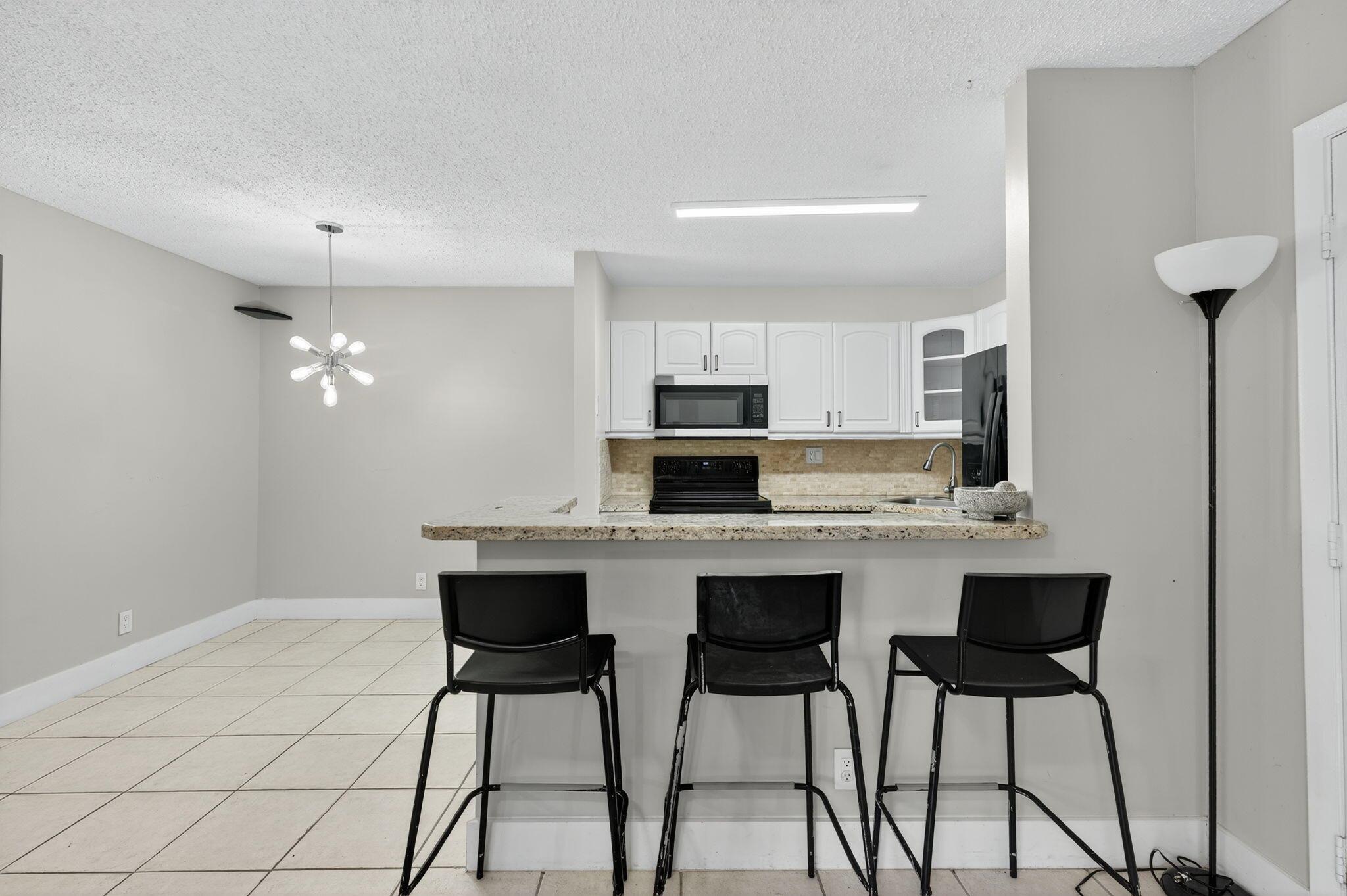 TAMARAC GARDENS CONDOMINI - Residential