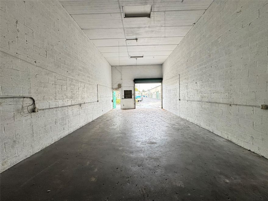 Now available for lease, this ±1,000 SF warehouse in Pompano Beach offers a practical and efficient layout with a single roll-up door and private restroom. The space features a long, open floor plan ideal for storage, light industrial work, or small business operations. Situated within Turnpike Commercial Plaza, the property provides easy access to Florida’s Turnpike and other major routes. Zoned I-1 (General Industrial), the unit includes one reserved parking space along with plenty of guest parking.  Utilities separately metered.