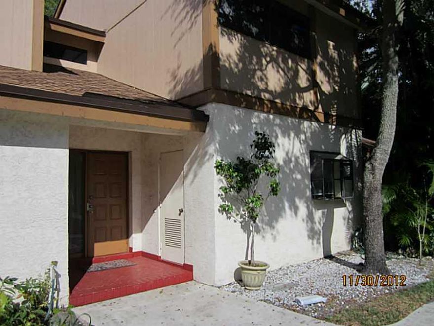 Like a private home, this remodeled 3 bedroom TH is nestled in heart of Coconut Creek! 2 pkg sp right in front, community pool just steps away, and full access to all the Township amenities..gym, theater, basketball, tennis! One of the largest layouts in the Township, and small pets allowed too! Wood laminate floors in living area, granite in kitchen. Half bath downstairs, two full baths up. Secluded screened in patio off the back, and Gerber Park is just across the street. Extra storage. MONARCH HS!