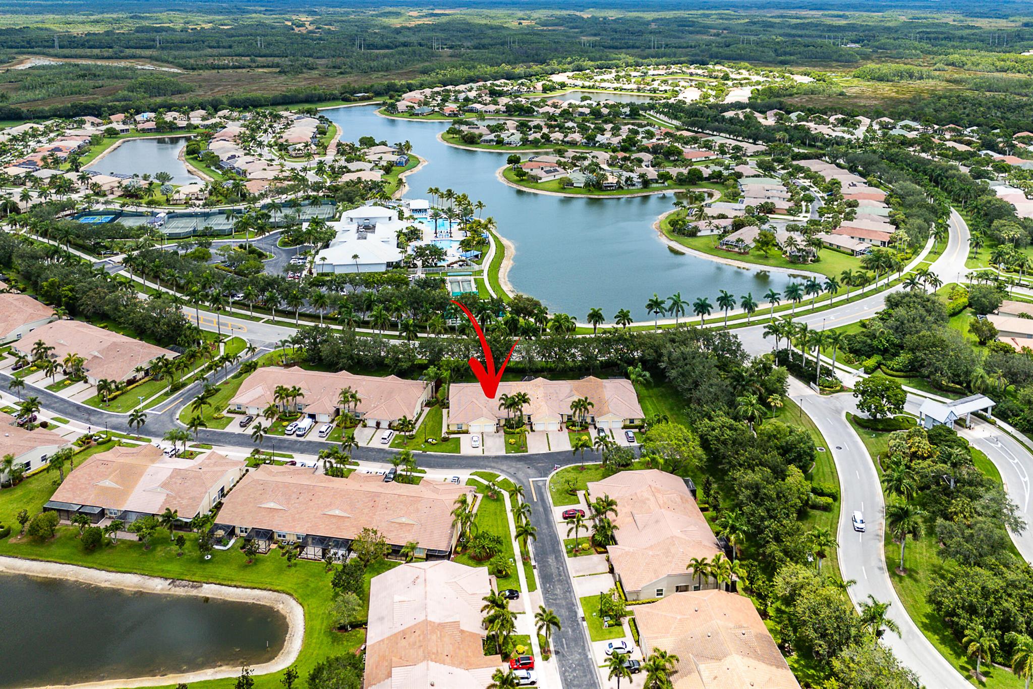 Welcome to Bridgeport section of Baywinds, a 55+ gated community. This open concept single story home offers a spacious split-bedroom layout, ceramic tile floors with wood in primary. Featuring high ceilings a screened in patio, accordion shutters & 1 car garage. Baywinds features resort style amenities: clubhouse, pools, fitness, tennis, pickleball, bocce, shuffleboard & more. Close proximity to turnpike & dining/shopping.
