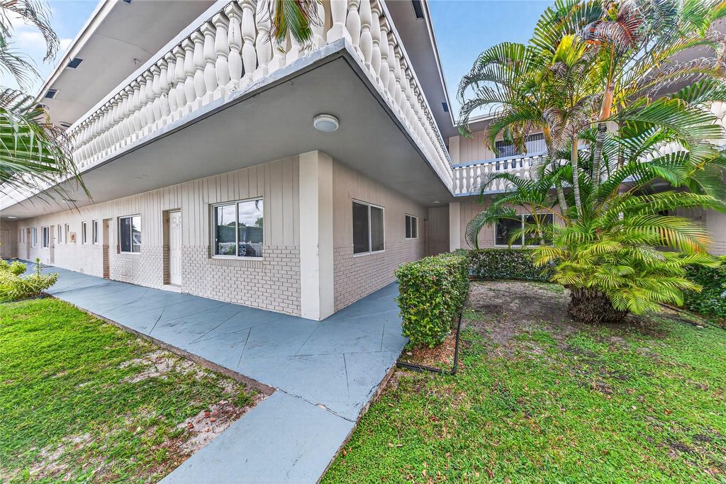 Photo of 199 E Mcnab Rd #107, Pompano Beach, FL 33060 (MLS # F10535227)