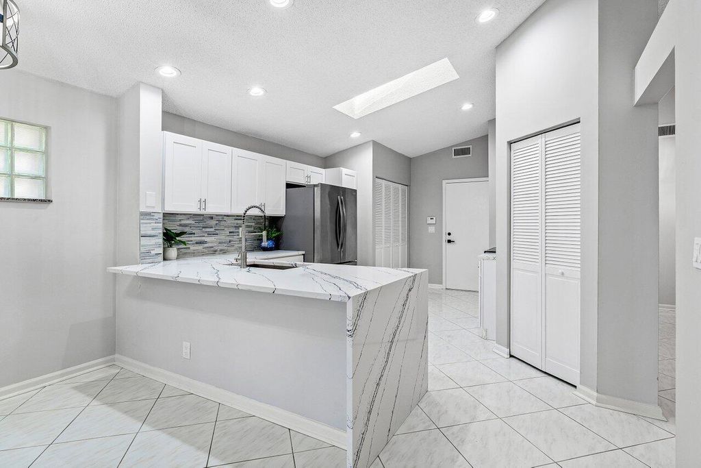 Photo of 9934 Harbour Lake Circle, Boynton Beach, FL 33437 (MLS # R11081884)