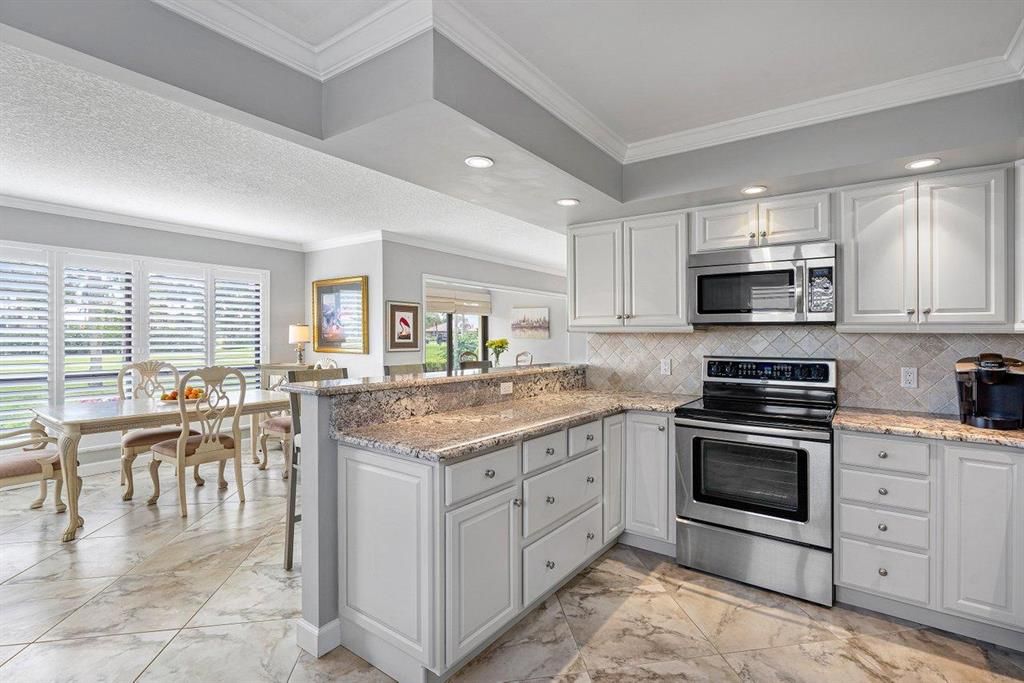 Photo of 3721 Quail Ridge Drive N #Bobwhite C, Boynton Beach, FL 33436 (MLS # R10685120)