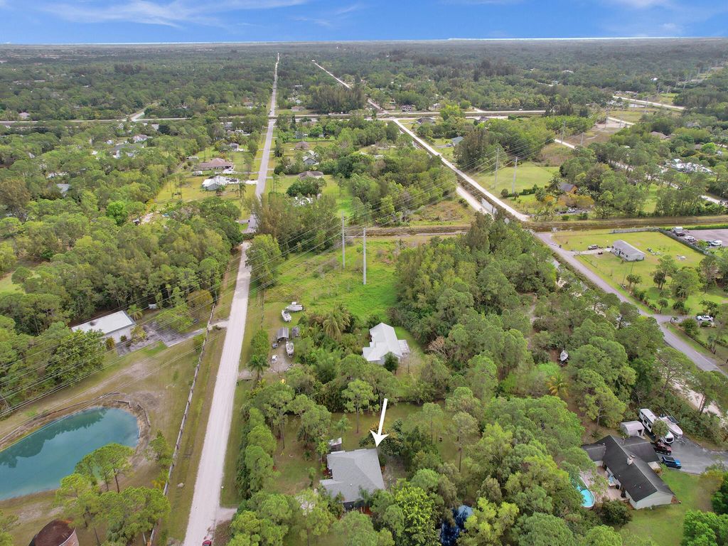 Photo of 13392 63rd Lane N, The Acreage, FL 33412 (MLS # R10966093)