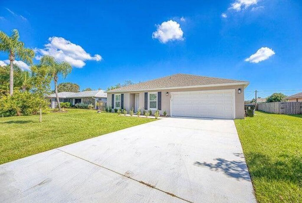 Photo of 1381 SE Bayharbor Street, Port Saint Lucie, FL 34983 (MLS # R11154070)